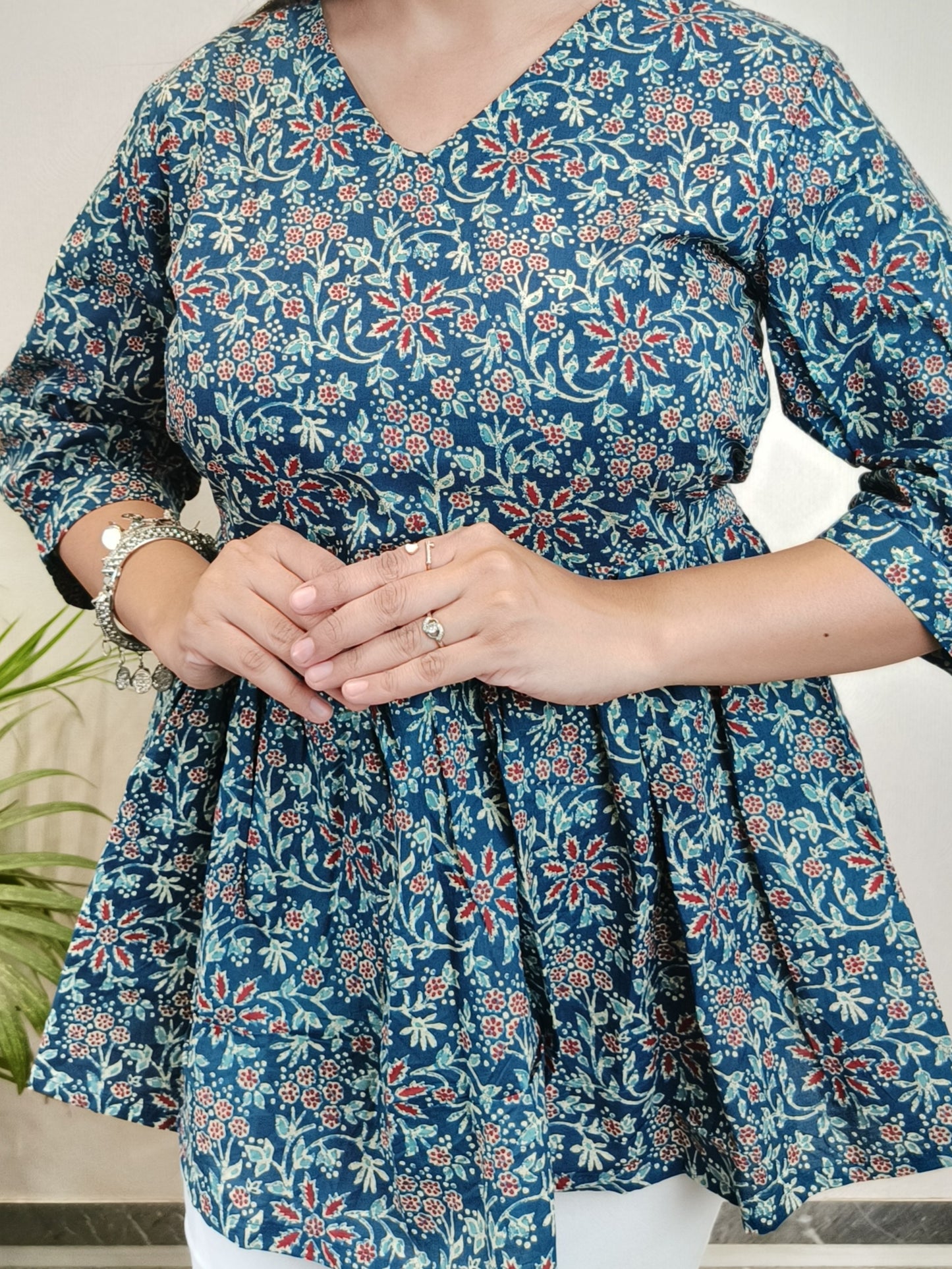 Blue and red floral jaal peplum top