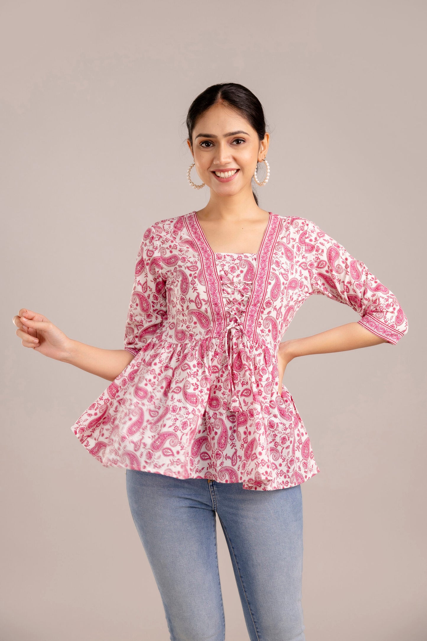 White and pink paisley peplum top