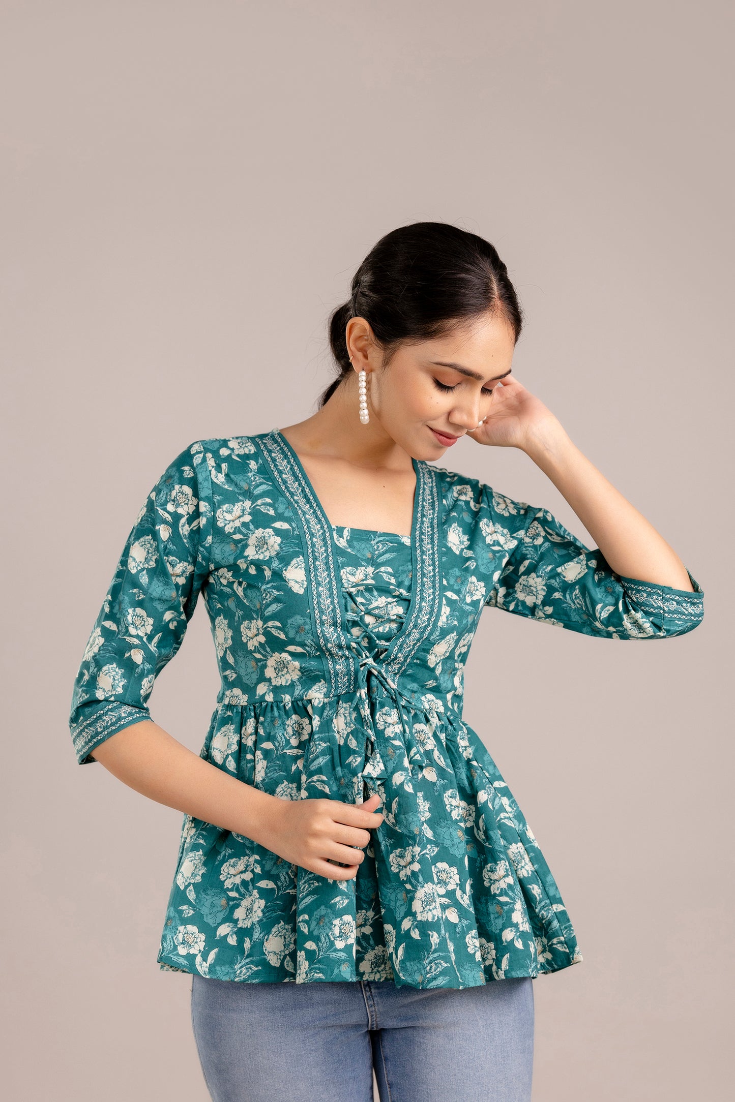 Dark green floral peplum top