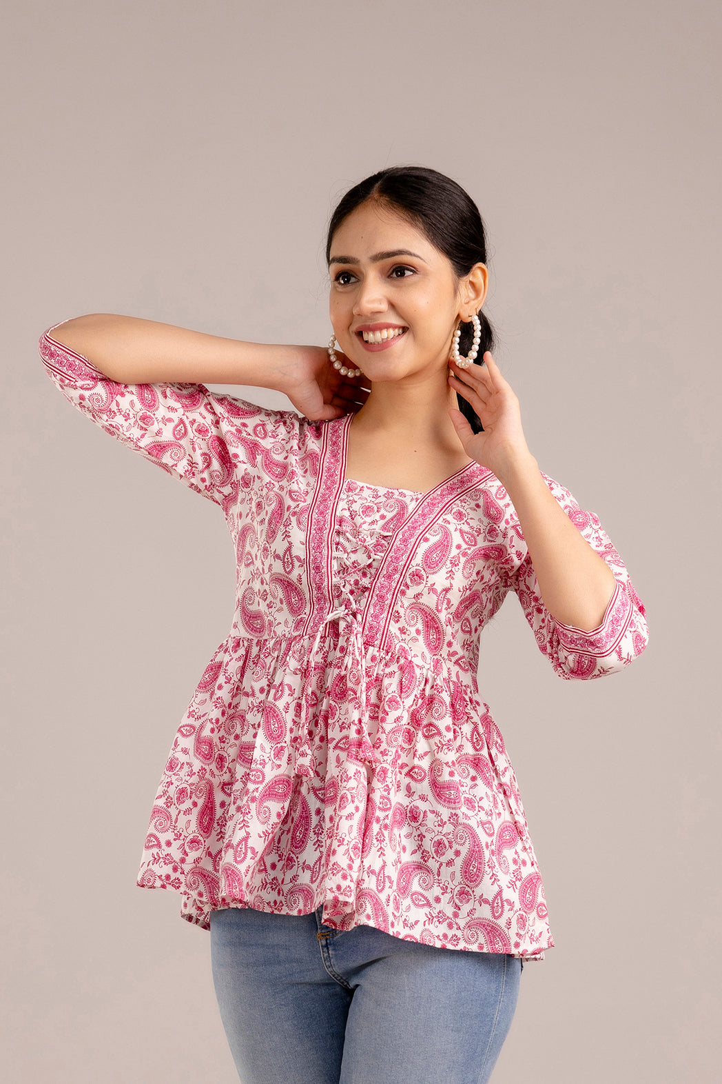 White and pink paisley peplum top