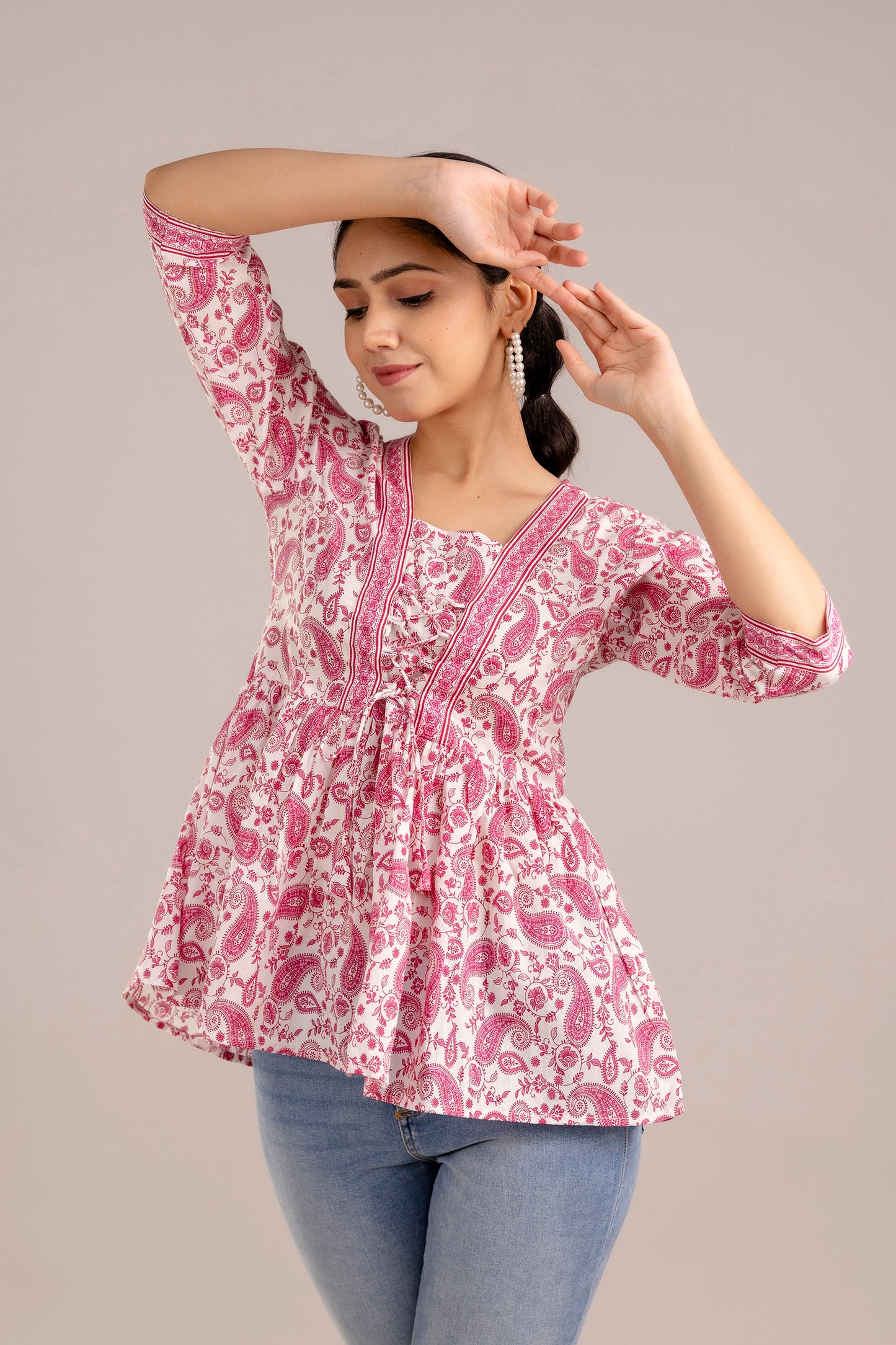 White and pink paisley peplum top