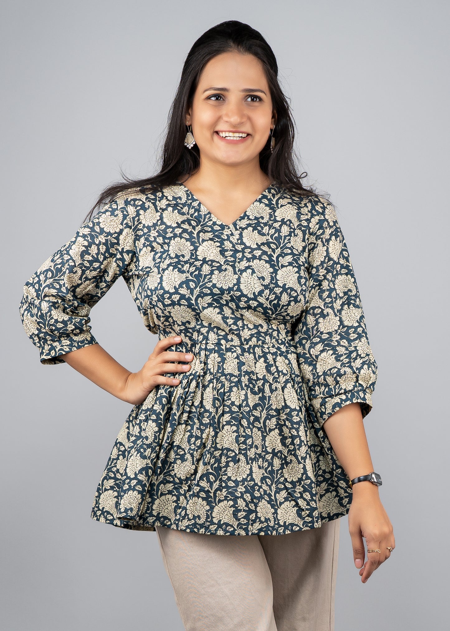 Blue and cream ethnic motifs peplum top