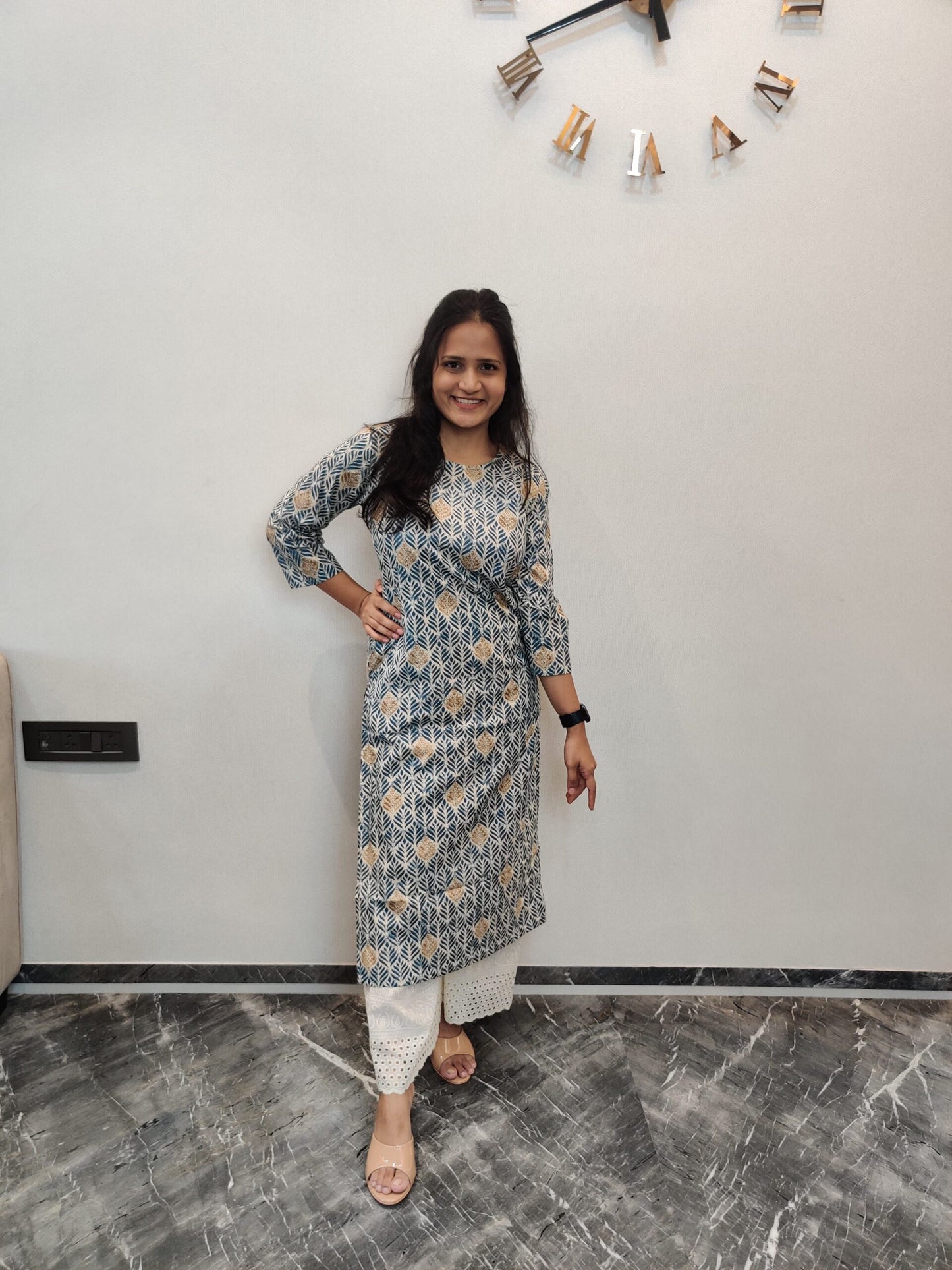 Cream long kurta with blue and golden leaf print