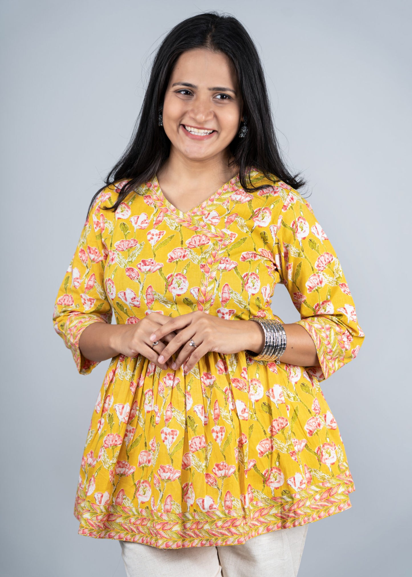 Marigold Yellow floral peplum top