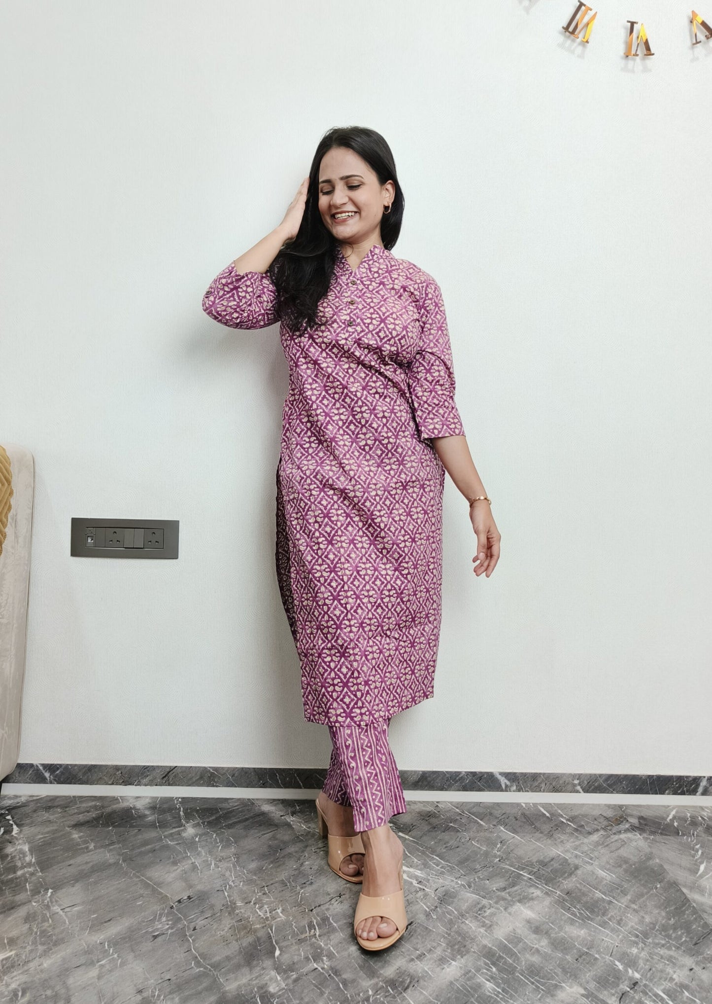 Purple motif printed kurta pant set