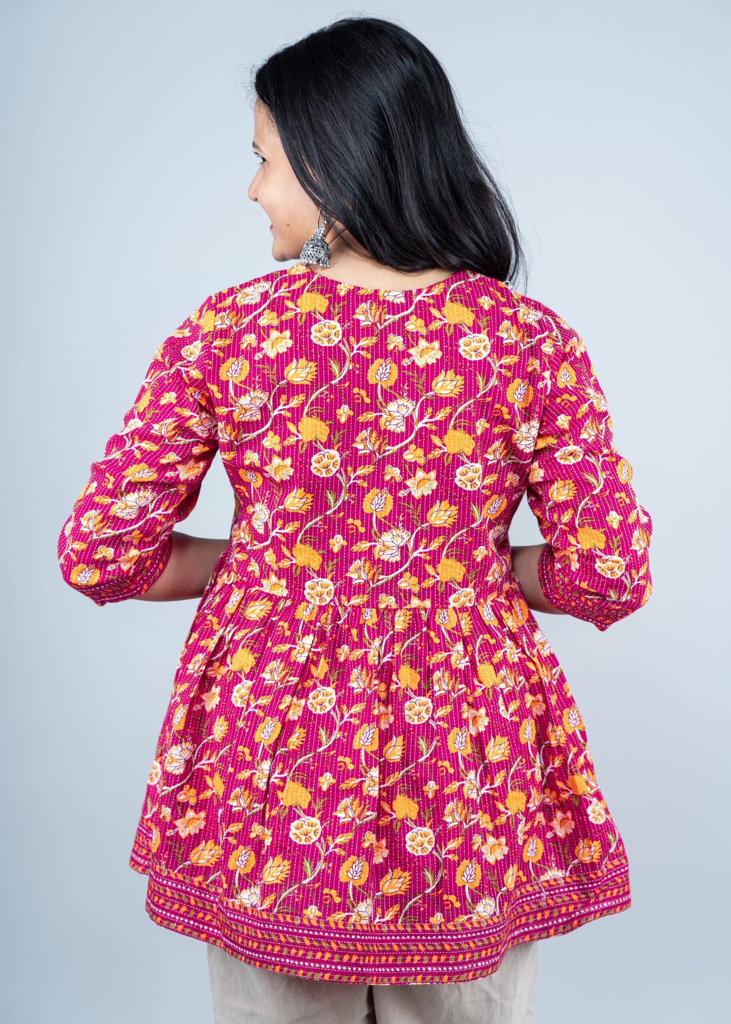 Rani Pink with Yellow floral peplum top