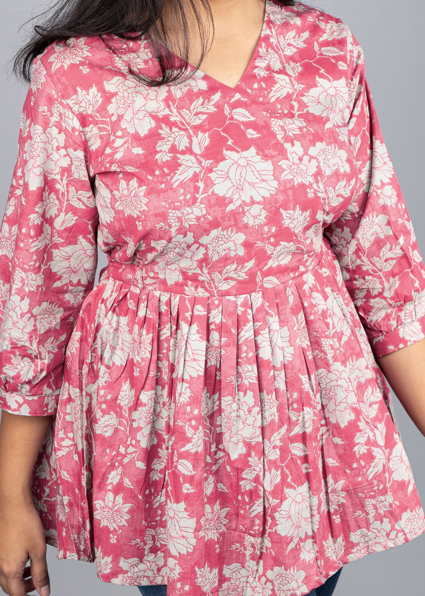 Ruddy pink floral peplum top