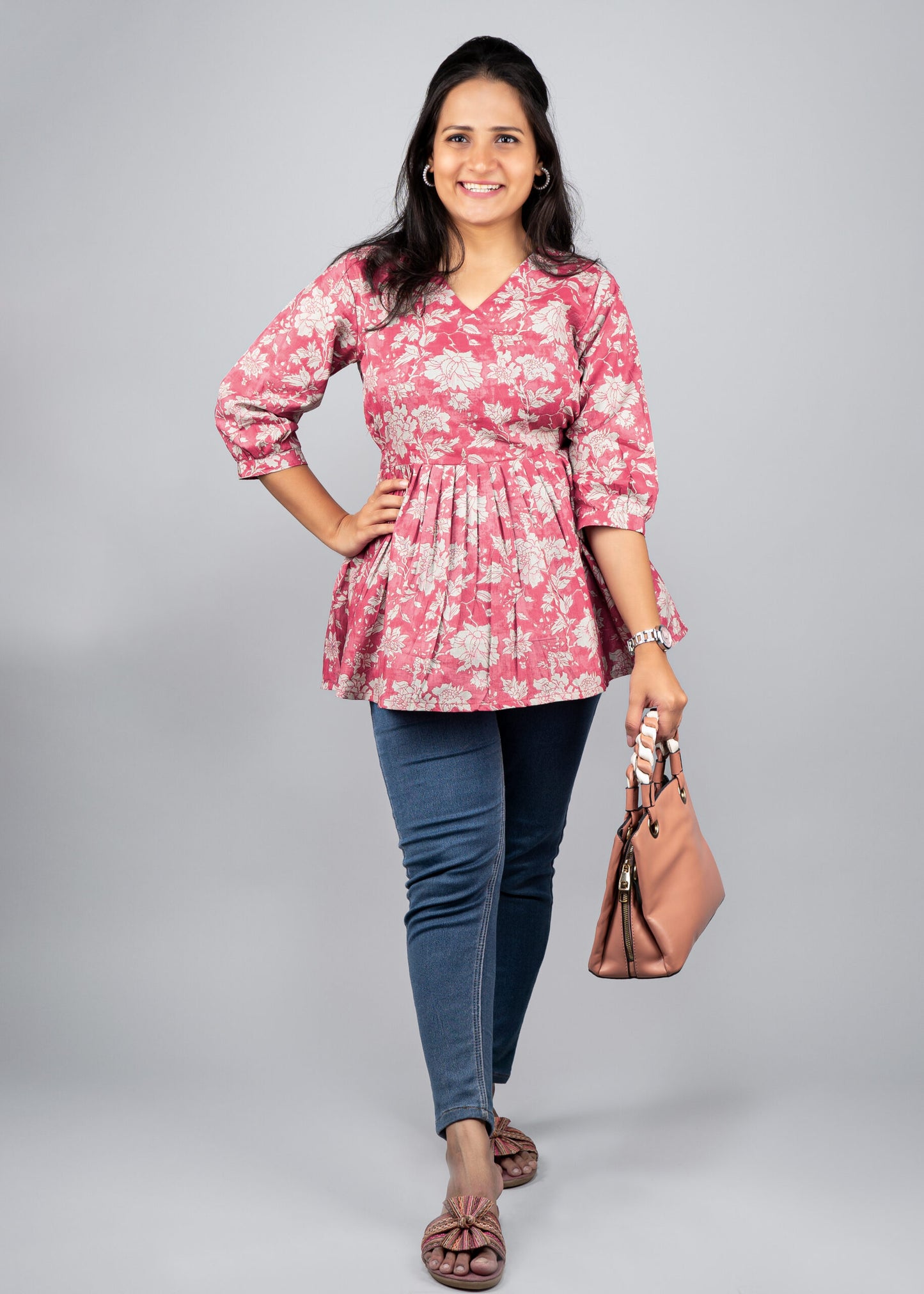 Ruddy pink floral peplum top