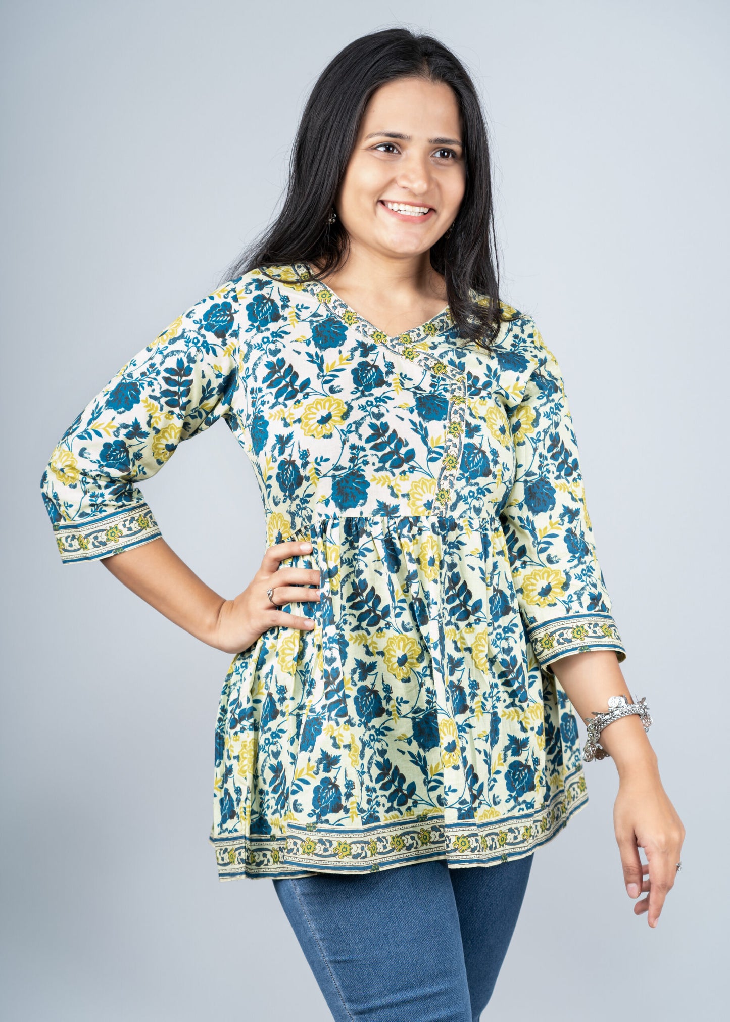 Tea Green with blue floral peplum top