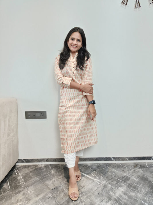 Cream and orange motif printed long kurta