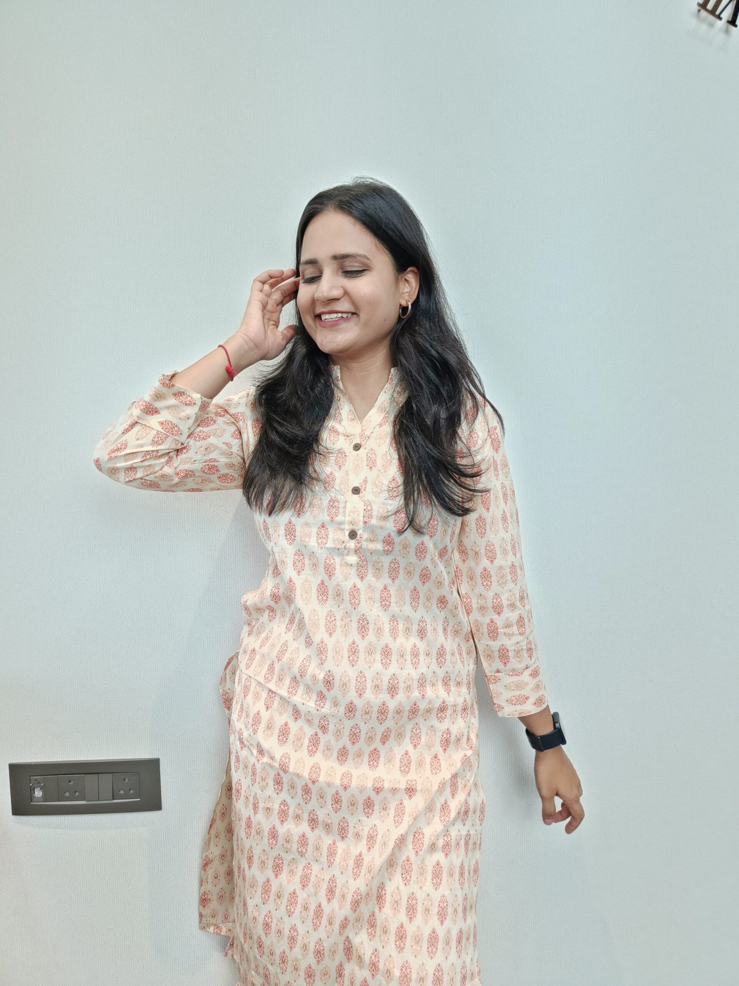 Cream and orange motif printed long kurta